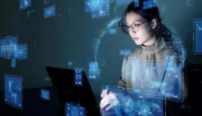 Marketing specialist analyzing data screens for SEO SMO PPC and content marketing strategies.